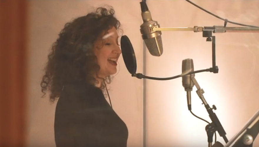 Svetlana singing in recording booth