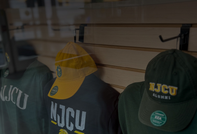 NJCU branded apparel on display.