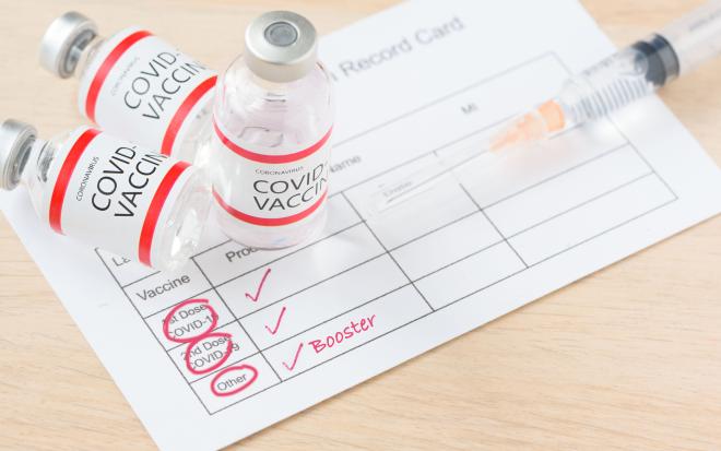 Booster dose of covid-19 vaccine - stock photo GettyImages-13434899