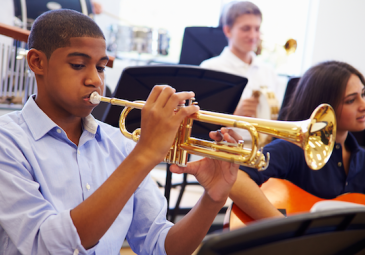 3 students in music class