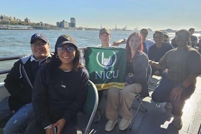 ASCM STUDENTS POSE ON SHIP